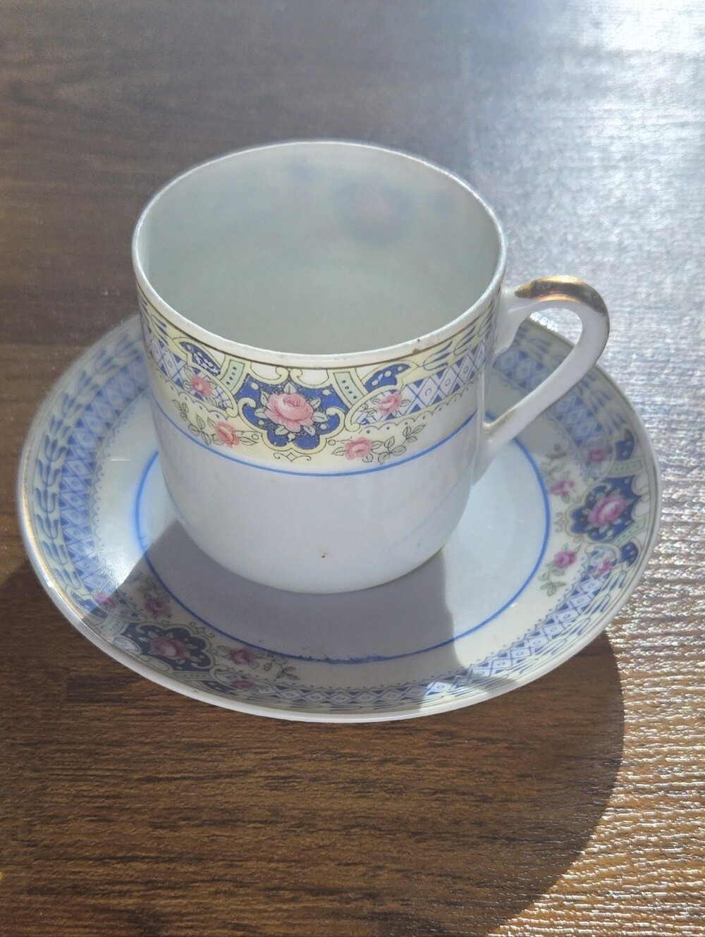 Vintage Porcelain White and Pink Floral Teacup with Saucer